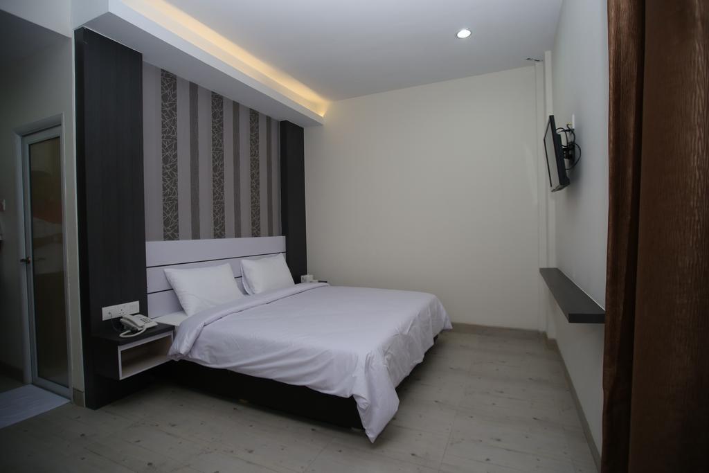 Redlink Hotel Batam Номер фото