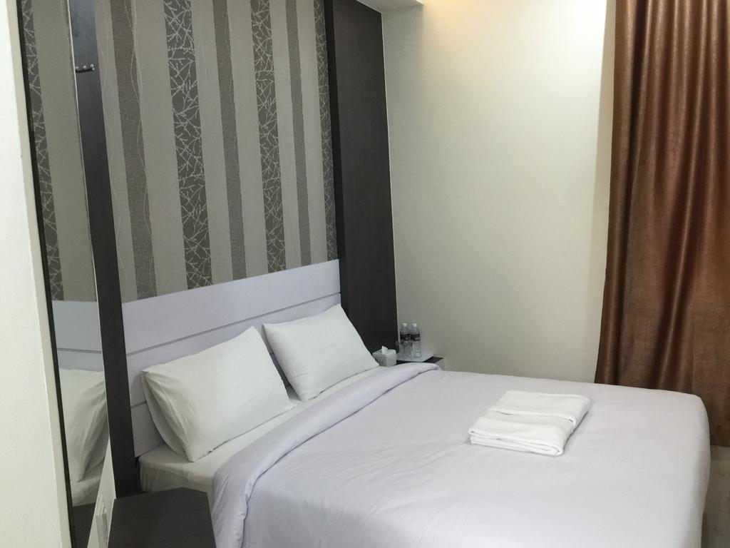 Redlink Hotel Batam Номер фото